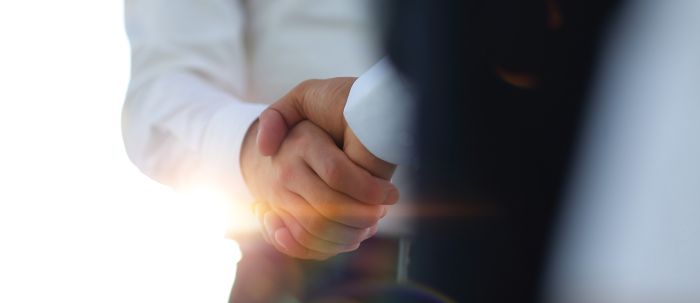 two business men shaking hands